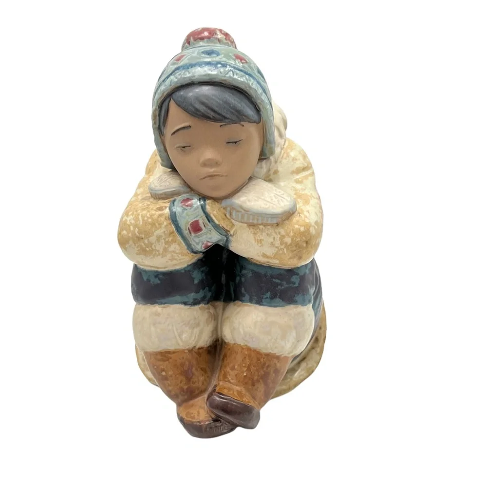 LLADRO PENSIVE ESKIMO BOY FIGURINE
